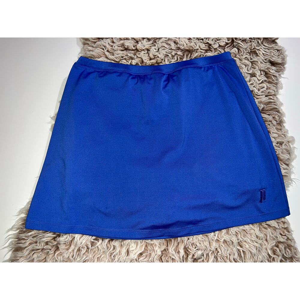 Prince women’s blue tennis shirt with built in shorts